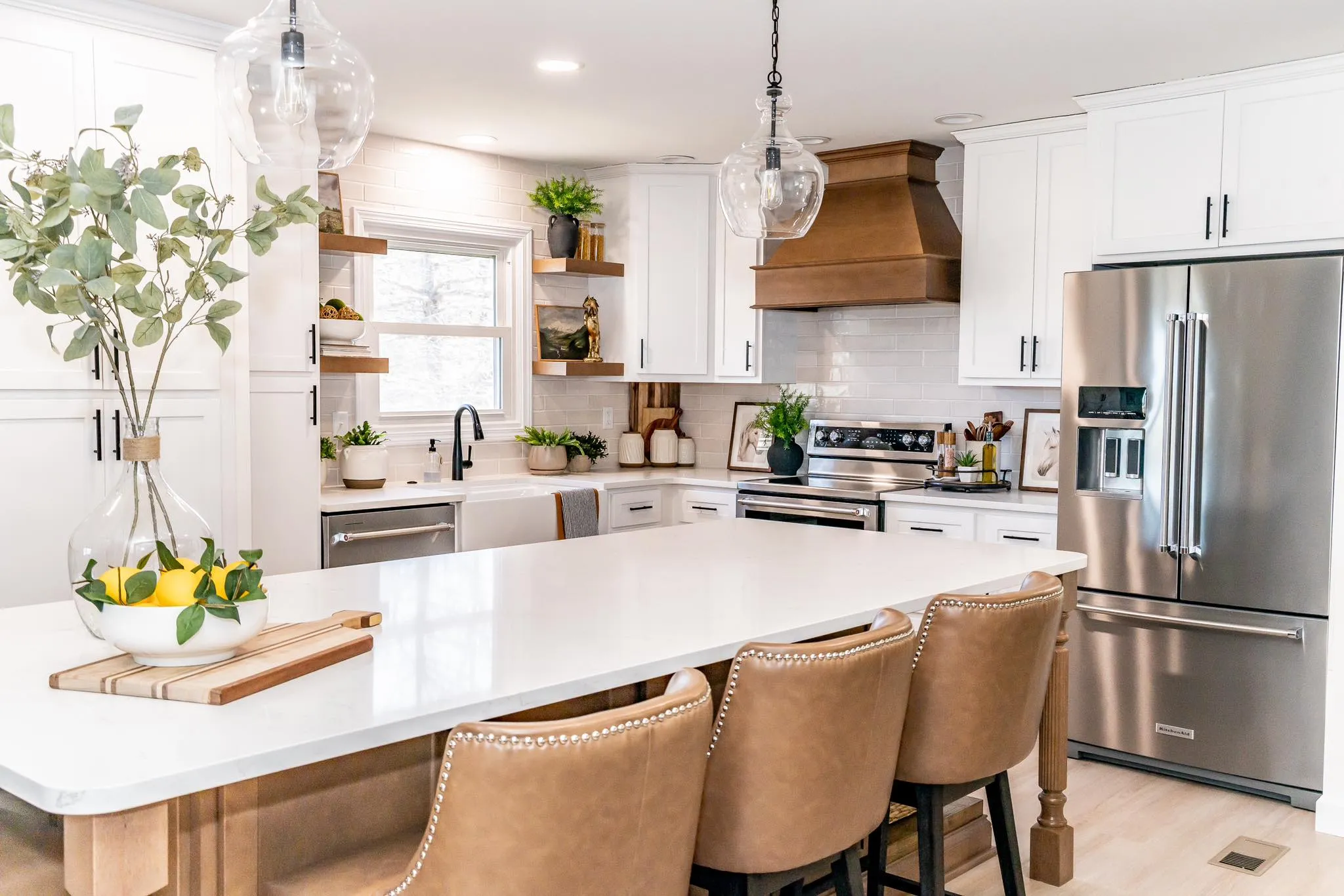 Modern kitchen with white cabinets and island